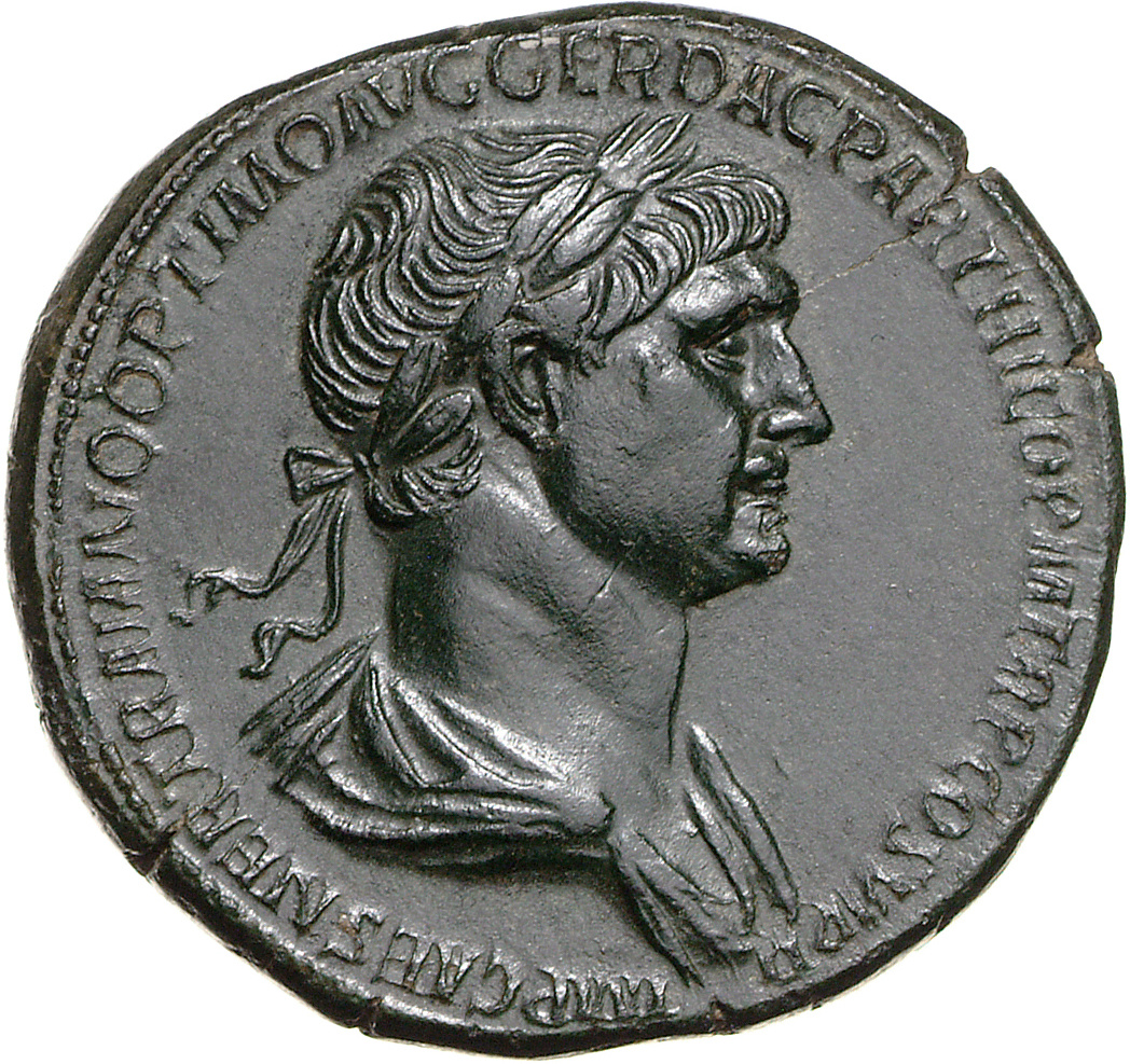 Römische Bronzemünze "Sesterz" mit dem Porträt des Kaisers Traian.